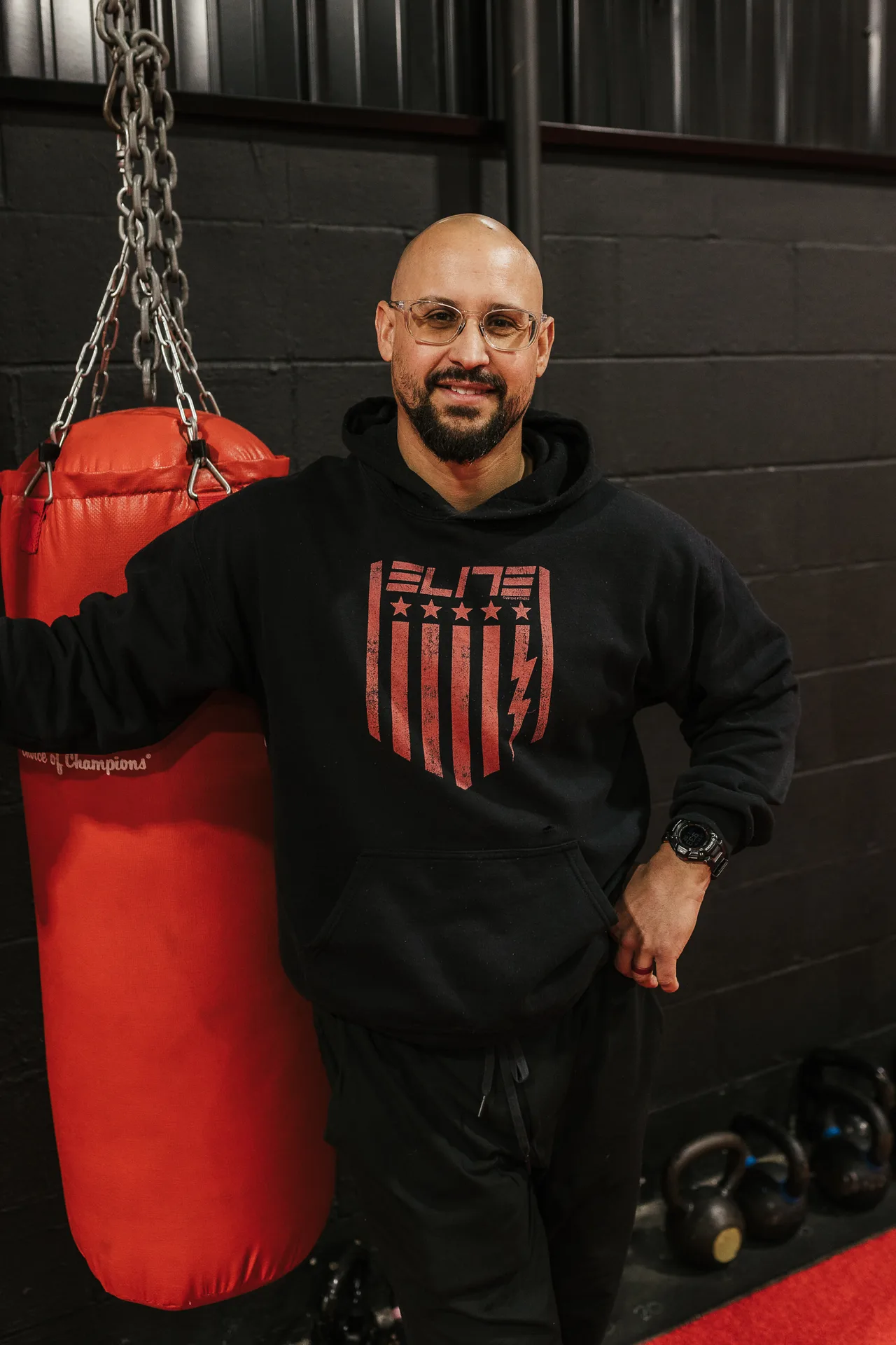 An Elite Custom Fitness strength coach